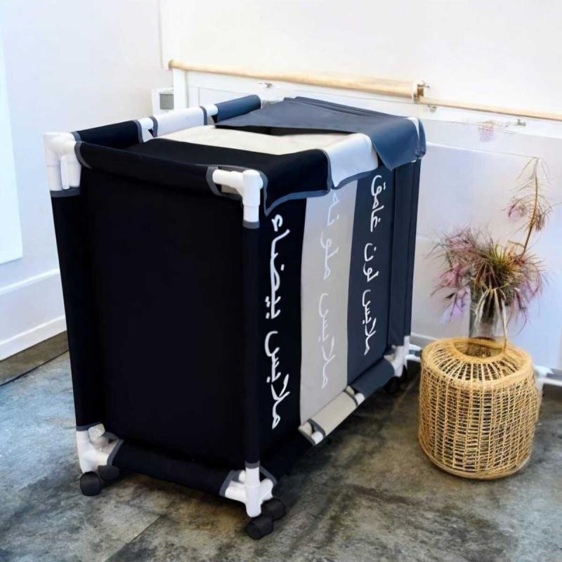 سلة غسيل 3 أقسام 64 X 60 X 35 سم,بعجلات وغطاء علوي، لتنظيم الغسيل بسهولة في البيت